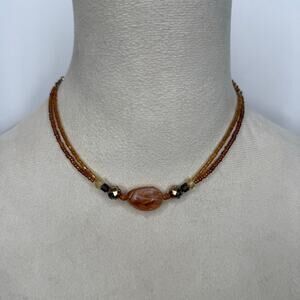 33. Orange beaded 2 strand necklace
